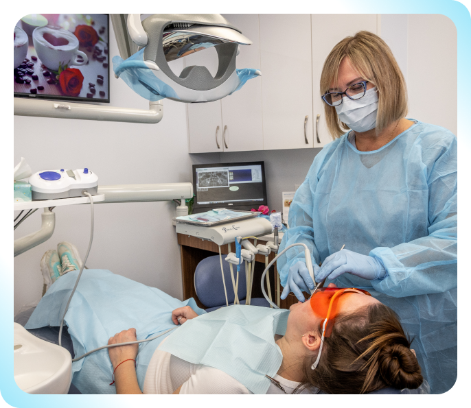 dentist treating patient's teeth